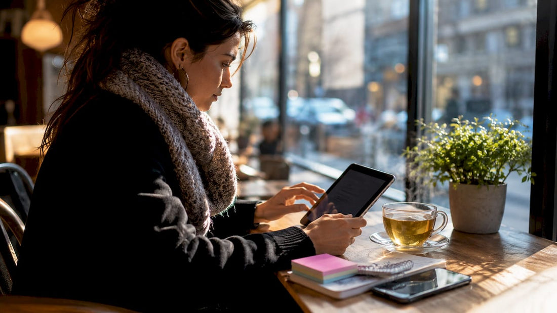 Woman customizing order on tablet at home