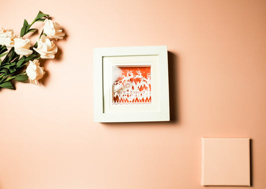 white wooden framed wall decor